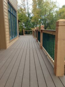TAMCO EVERGRAIN WEATHERED WOOD COMPOSITE DECK WITH CEDAR HANDRAIL METAL BALUSTERS