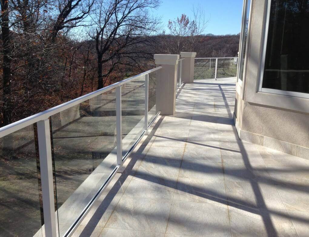 Tile deck, composite sub-floor, stucco columns, glass handrail, built in grill 2